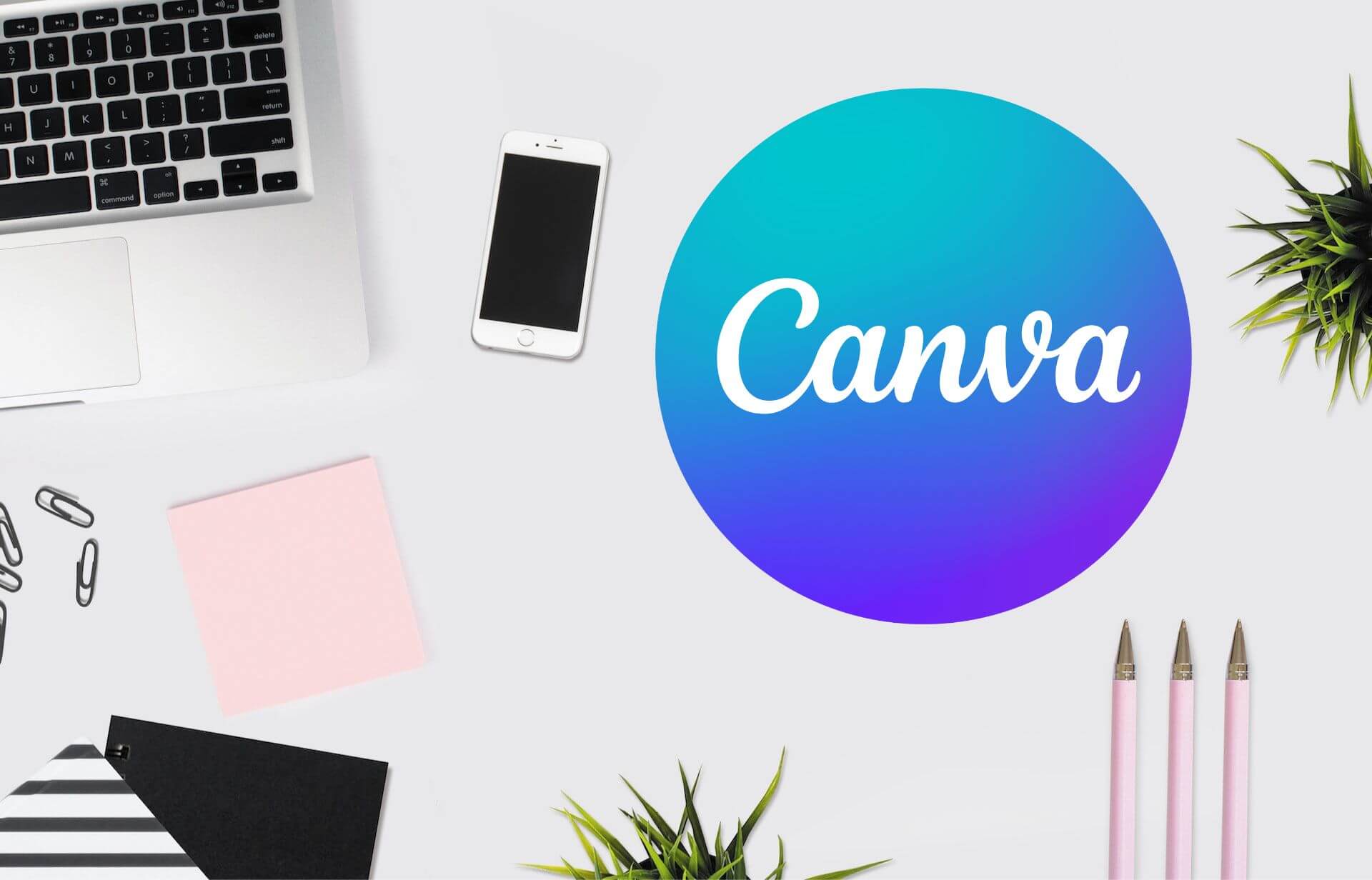 Desktop Photo with Canva logo for creating printable worksheets